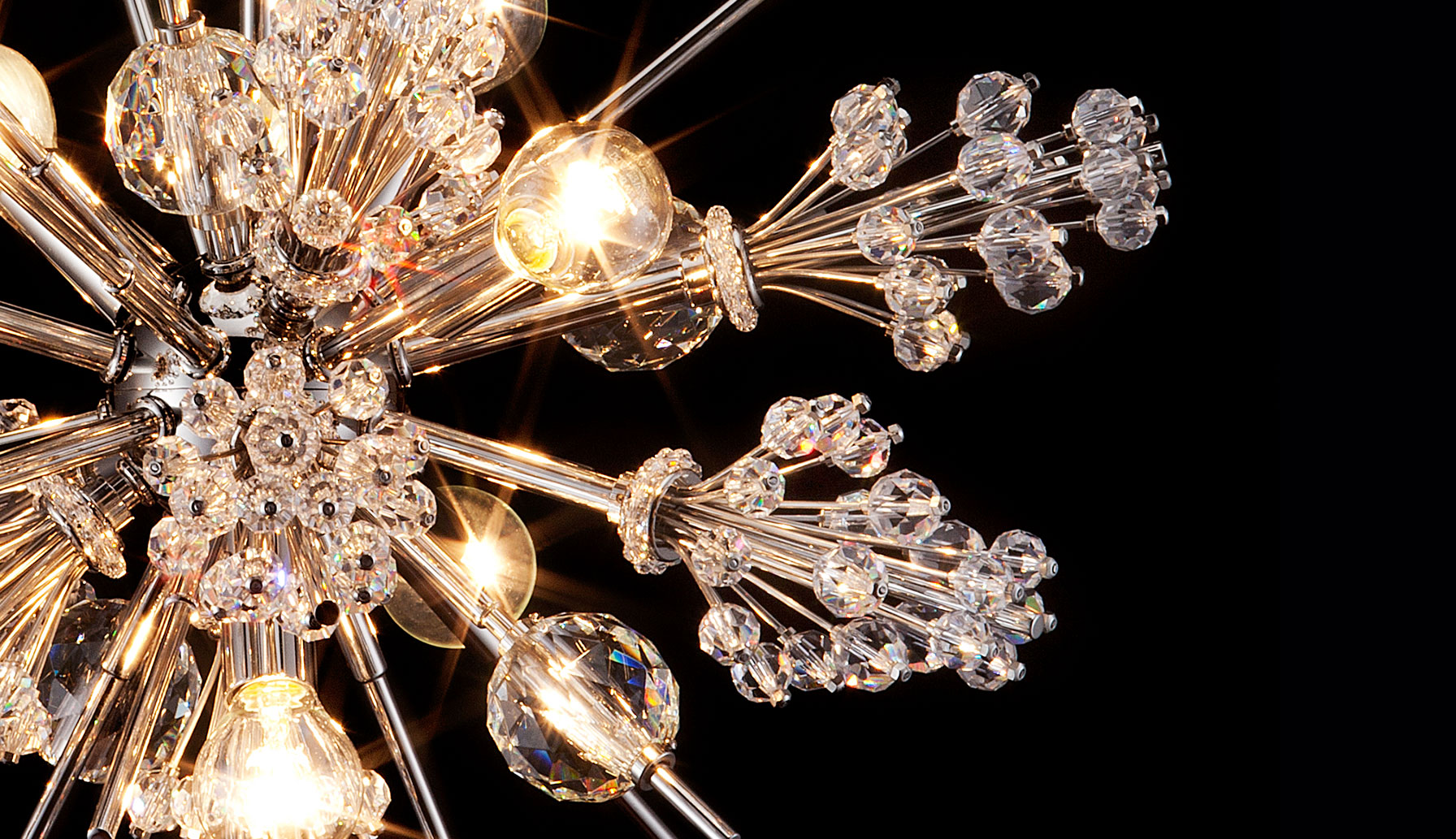 The iconic tuft details of an Auditorium chandelier in nickel finish